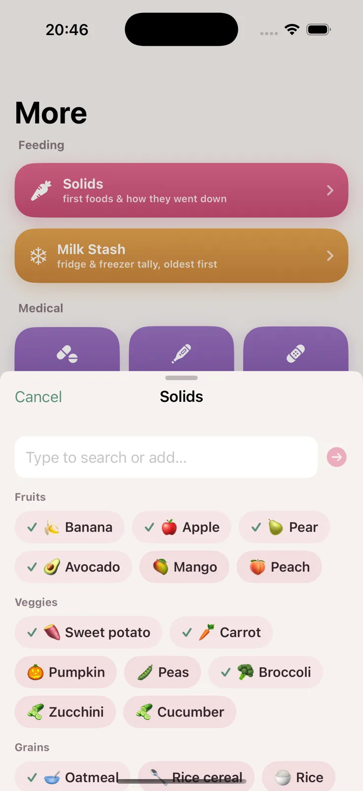 The solids picker: a search field, then fruits, veggies and grains as tappable chips, with green ticks on the foods already tried.